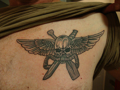 Marine Considered Unfit to ReEnlist Due to Rifle Tattoo
