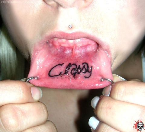 classy inner lip tattoo