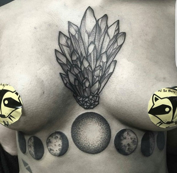 Gemstone sternum tattoo