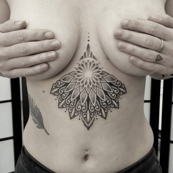 geometric-dotwork-sternum-tattoo