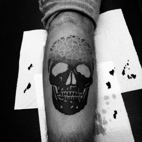 Patterned skull tattoo by Tiago Oliveira