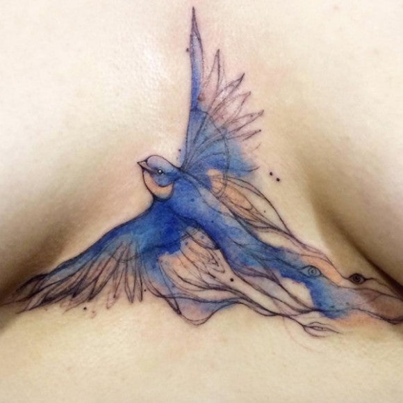 Aquarel vogel sternum tattoo