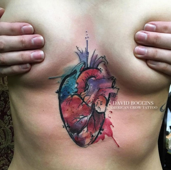 Watercolor heart sternum tattoo