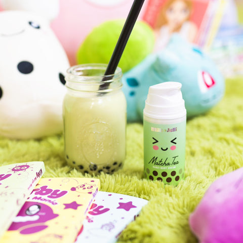 Milk Jelli's Matcha Tea Body Lotion on green carpet surrounded by Kawaii items.