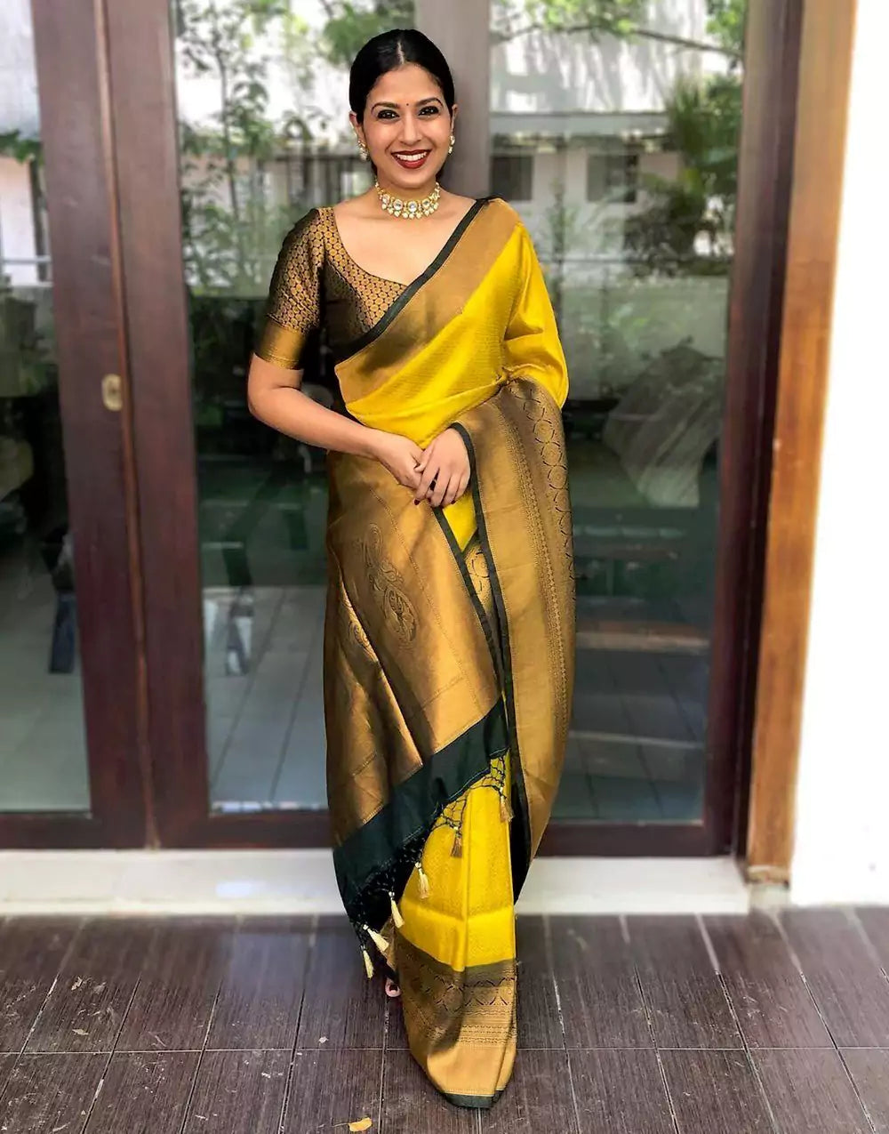 Woman Wearing a Colorful Saree Dress and Holding a Pot · Free Stock Photo