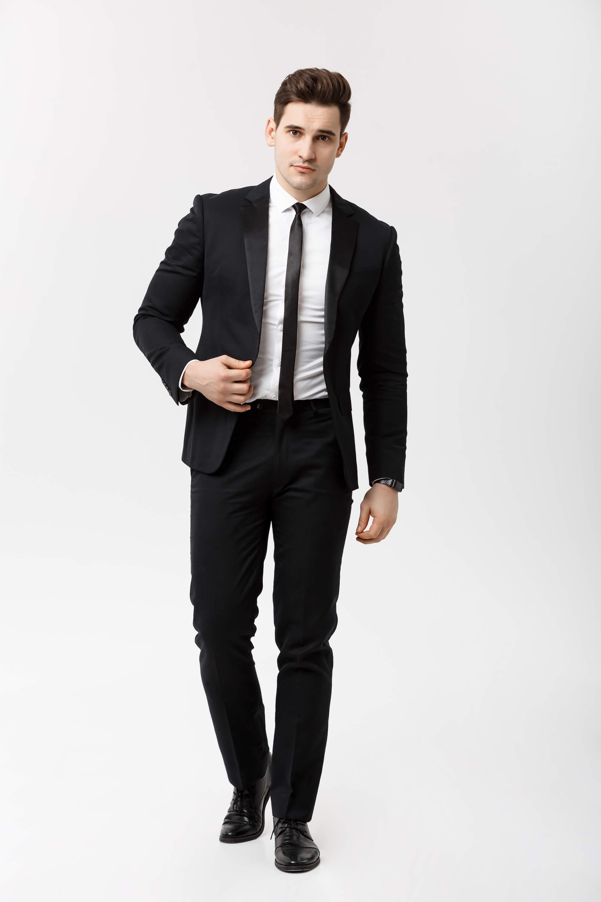 Young man in black suit