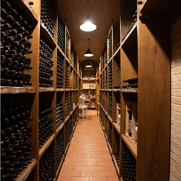 A large wine cellar with wooden racks