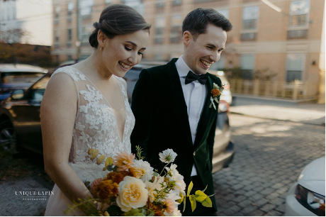 October wedding couple floral event outside The Castle in Red Hook Brooklyn Photo by Unique Lapin