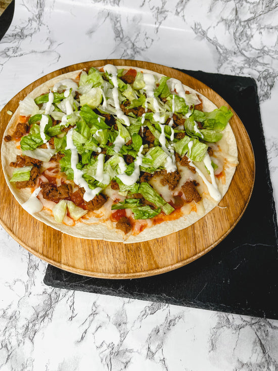 low-carb tortilla with cheese, beef, lettuce and sauce