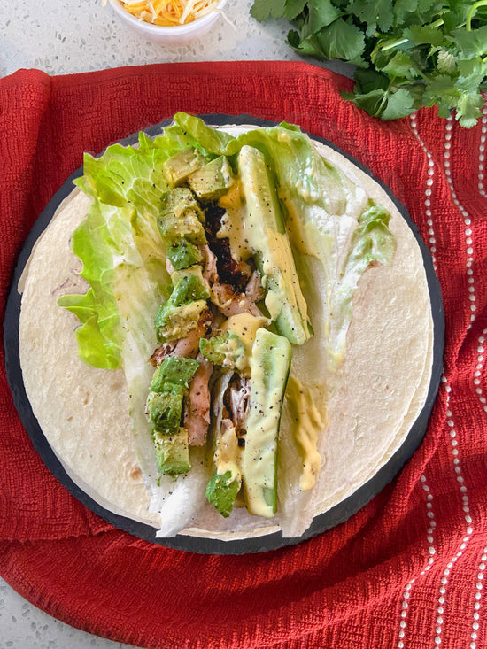 low-carb tortilla with  chicken, lettuce and sauce