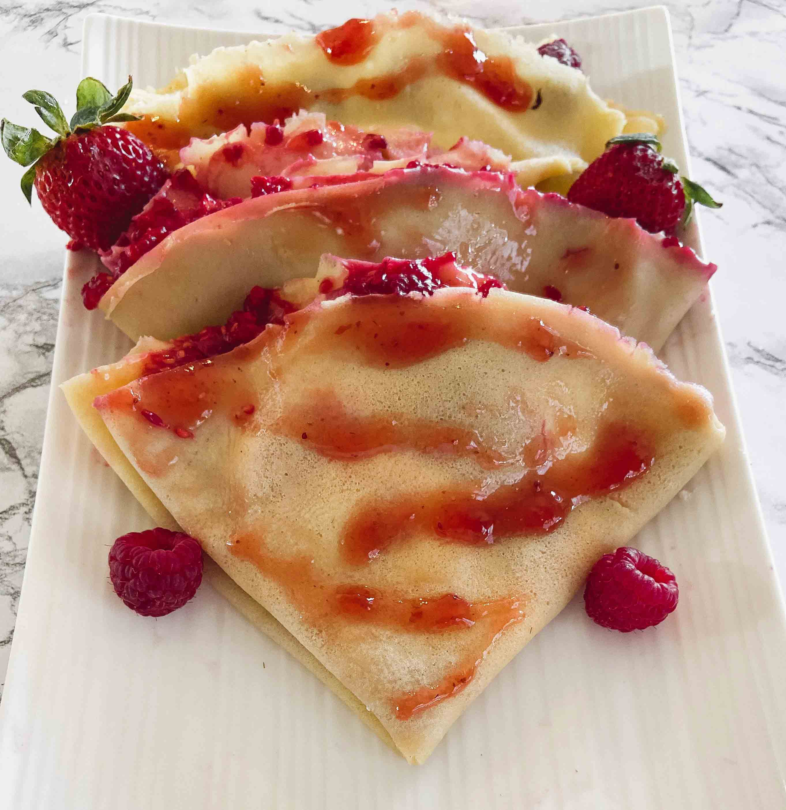 folded crepe with jam and strawberry