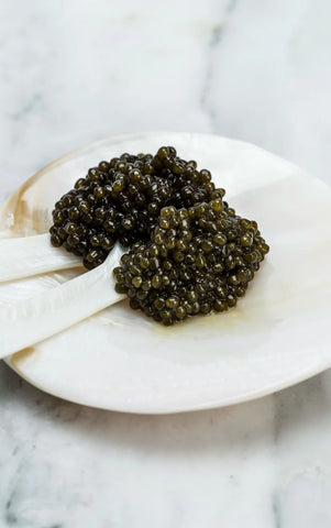 caviar on mother of pearl spoon