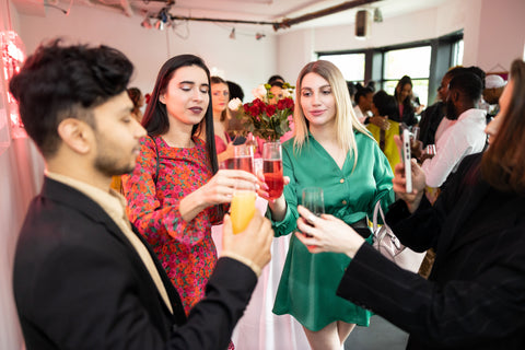 Guest toasting champagne glasses