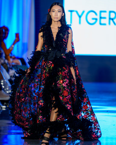 women in floral cape at Washington DC fashion week