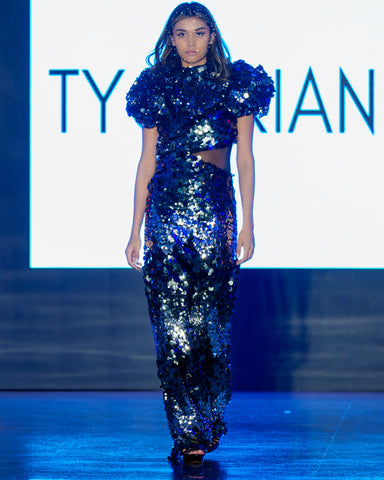 women in silver gown at Washington DC fashion week