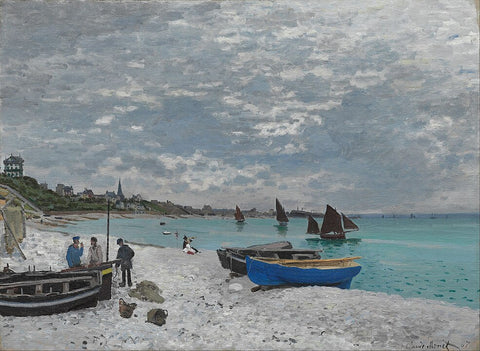 Boats being pulled onto a beach