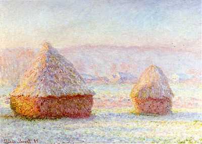 Two haystacks with frost