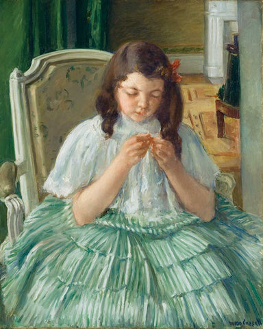 Portrait of girl knitting