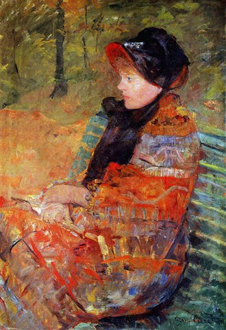 Woman sitting on a park bench