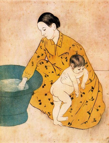 woman giving child a bath