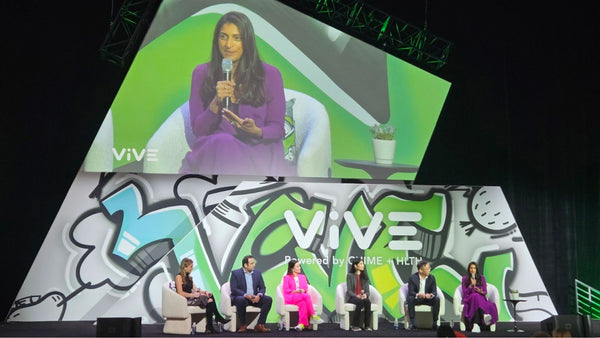 Dr. Manju Dawkins sits on stage with fellow panelists at ViVE24