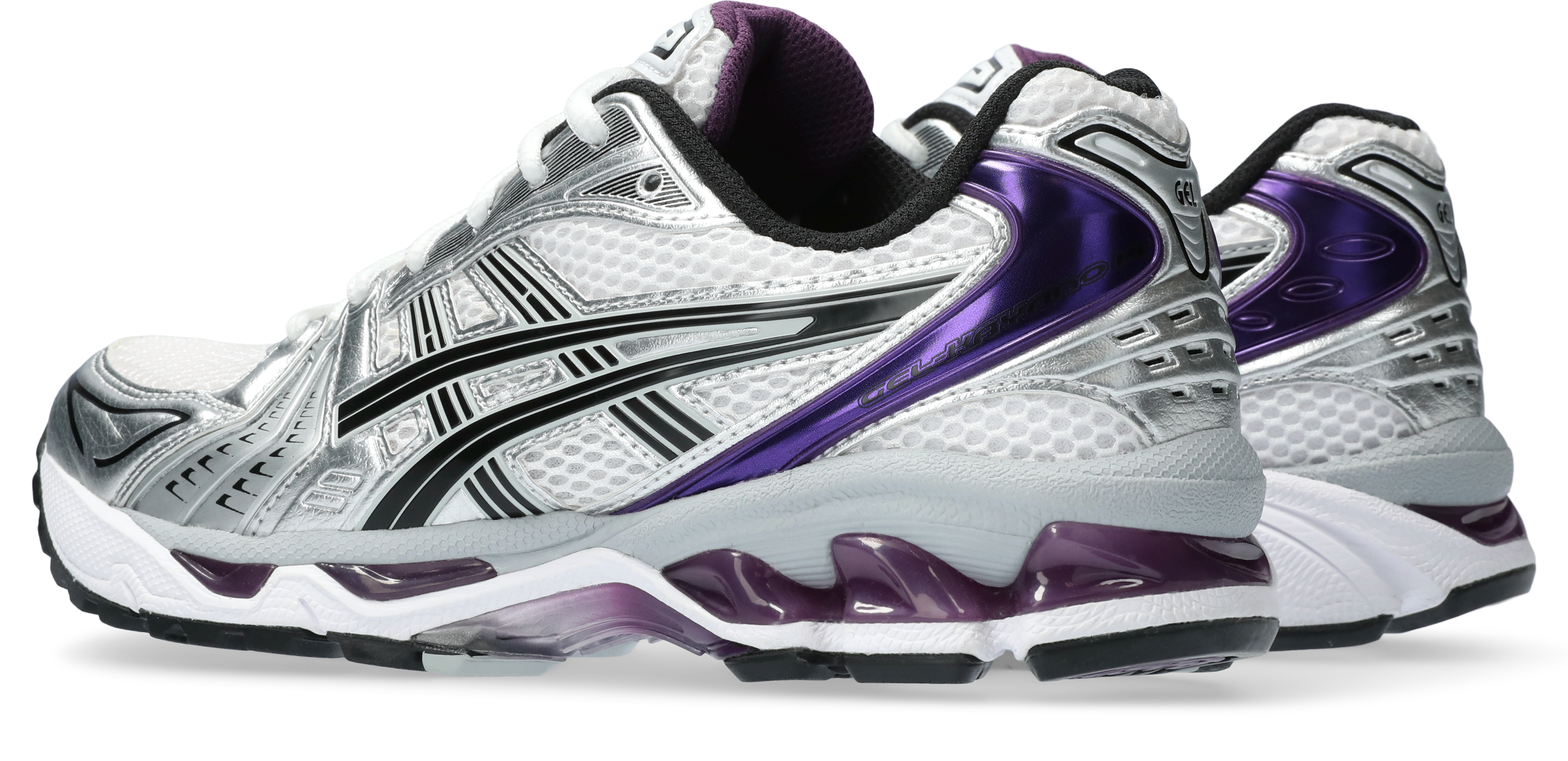 ASICS Kayano 14 sneakers in a vibrant Purple Metallic colorway, reflecting a mix of retro aesthetics and contemporary design elements in a strikingly glossy finish.