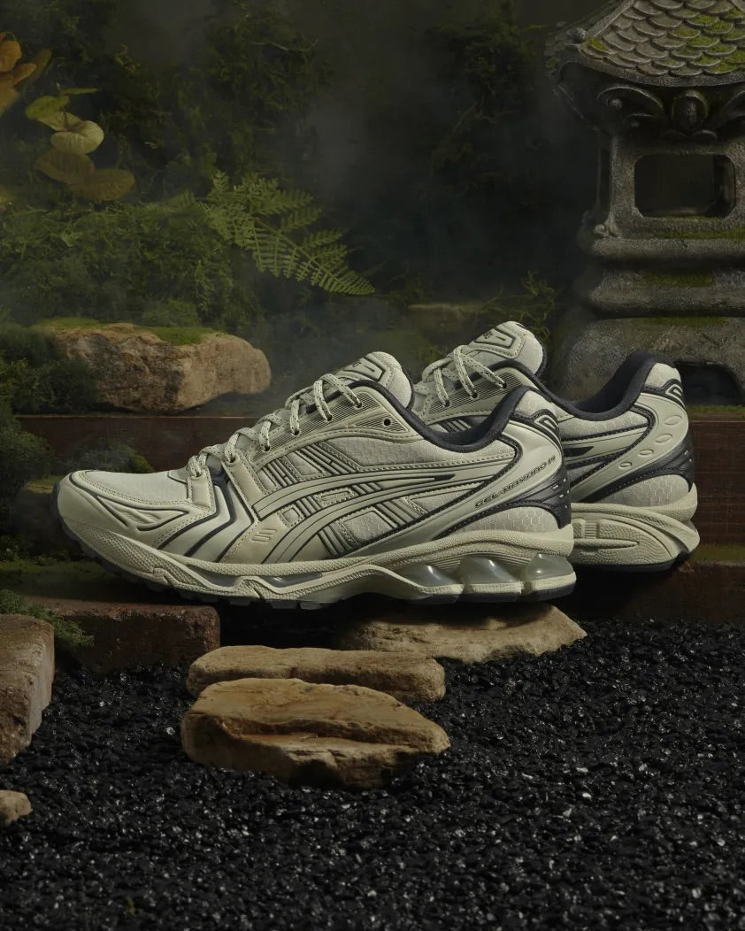 ASICS Kayano 14 Earthenware shoe in White Sage/Smoke Grey, showcasing its nature-inspired color palette and durable design features.