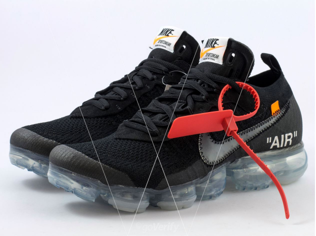 black vapormax with red check