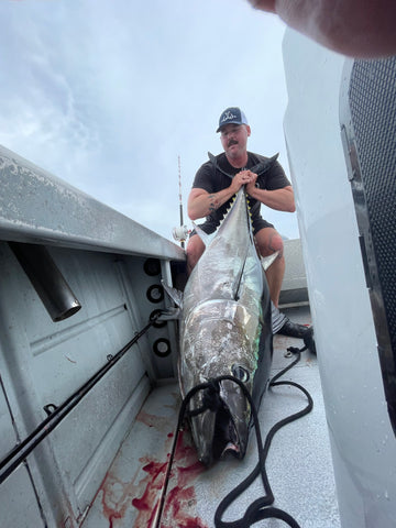 Chris Madison catching a big blue fin tuna on Slayday Boat Rental of San Diego