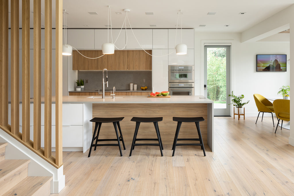 Kitchen which features engineered flooring in wood called Berkeley White Oak by Woodpecker and available from Hyperion Tiles