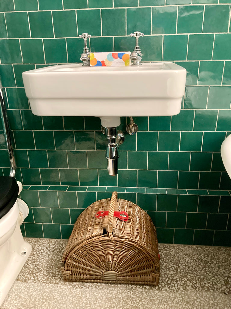 Basin with tiled backsplash supplied by Hyperion Tiles