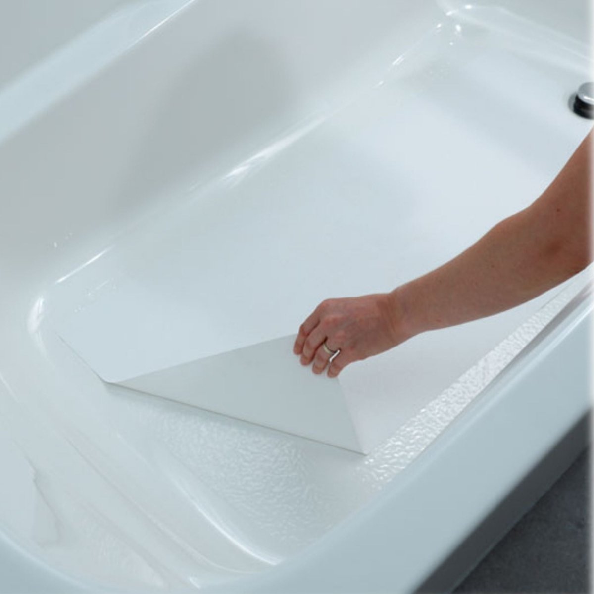 https://cdn.shopify.com/s/files/1/0619/6307/5793/products/ultra-thin-non-slip-adhesive-bath-mat-free-roller-presser-included-sa077-555372.jpg?v=1689691374&width=1200