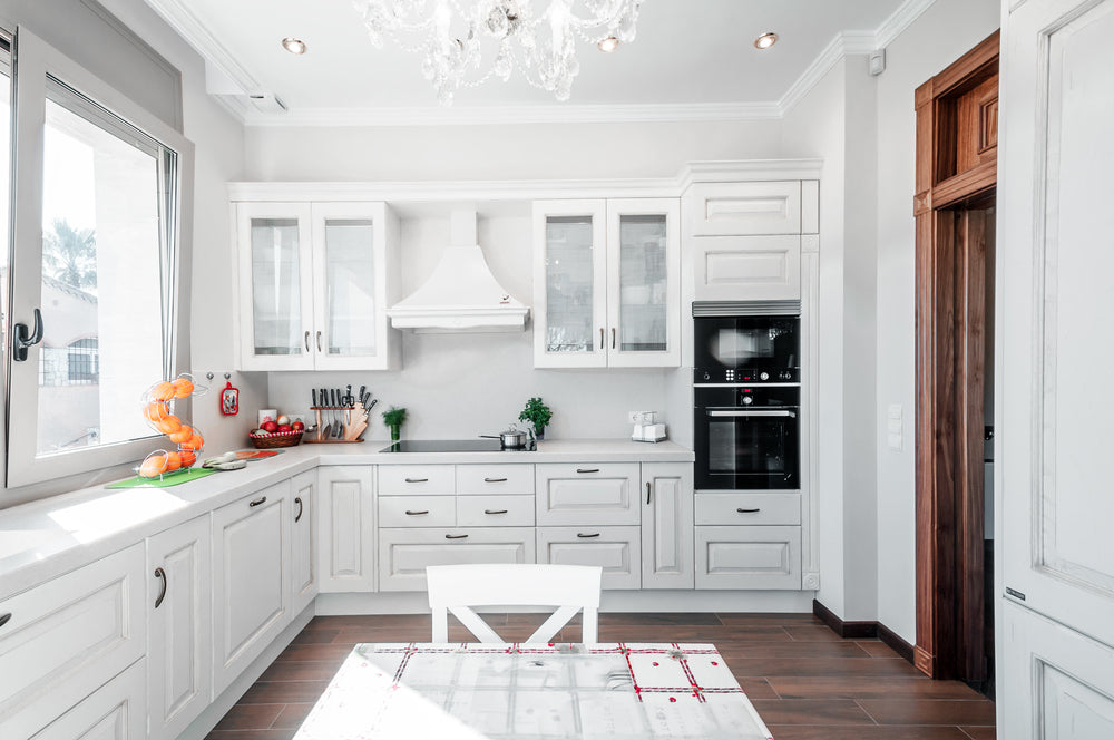 Kitchen interior in new luxury home with touch of retro. Modern appliances.