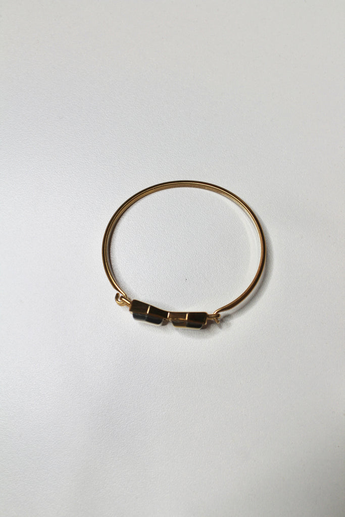 Kate Spade take a bow black/gold bangle with hinge – Belle Boutique  Consignment