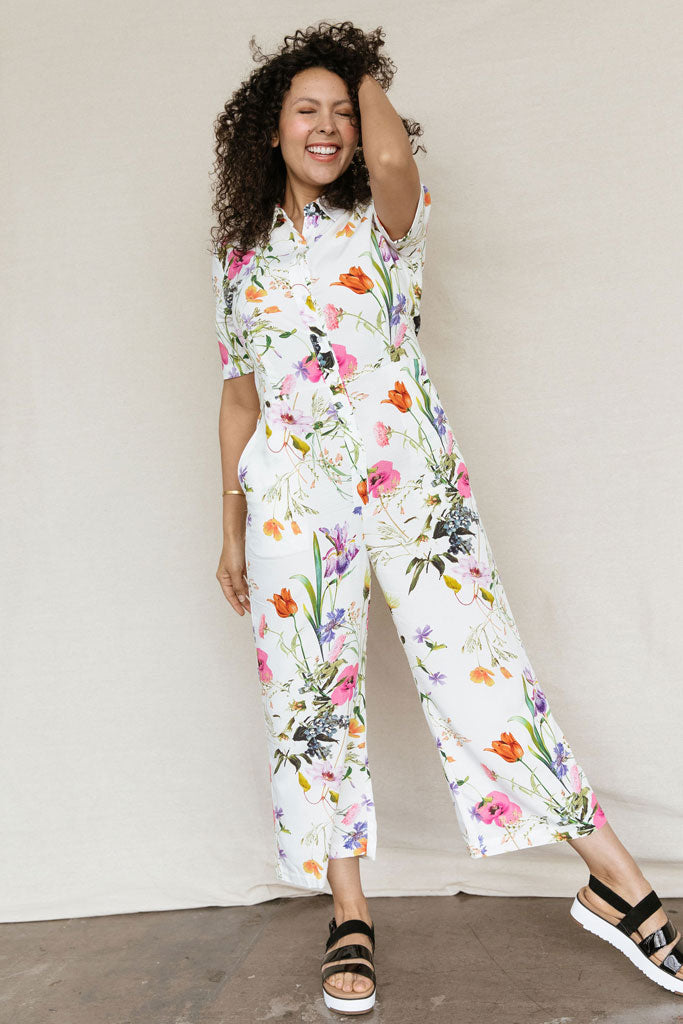 white jumpsuit with flowers