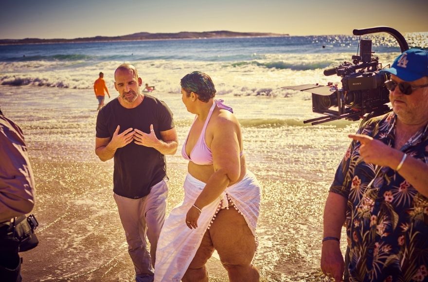 Jez and April talking on the beach