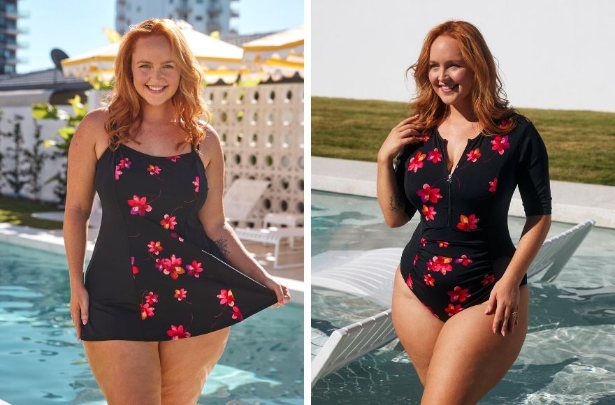 Woman with red hair poses in the pool wearing Black and pink floral swim dress and short sleeve one piece