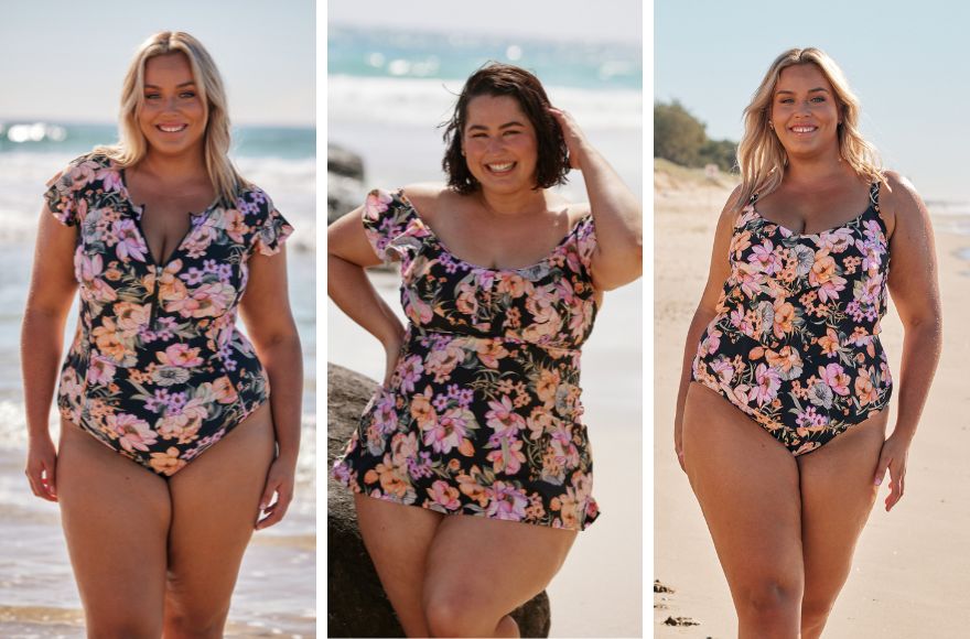Blonde woman and brunette woman wear different styles of black and pink floral swimwear