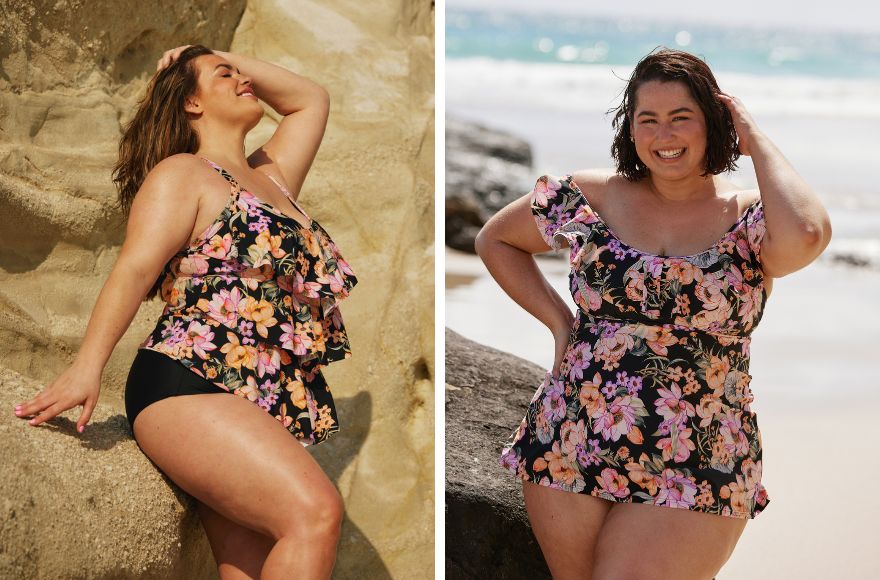 Woman with long brown hair wears black and floral ruffle tankini top and black pants. Woman with short brown hair wears black and floral frill swim dress.