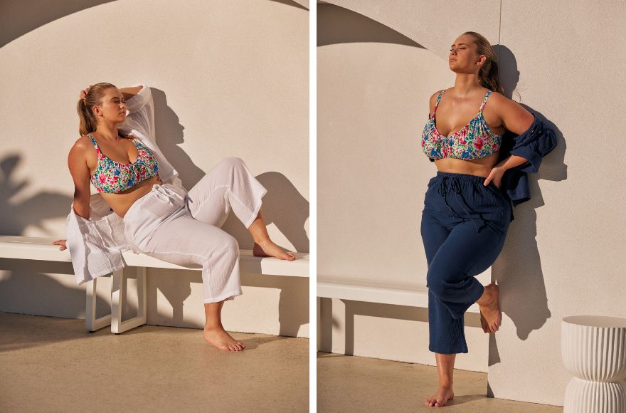 Woman with long blonde hair wears cotton loungewear over bright floral bikini top