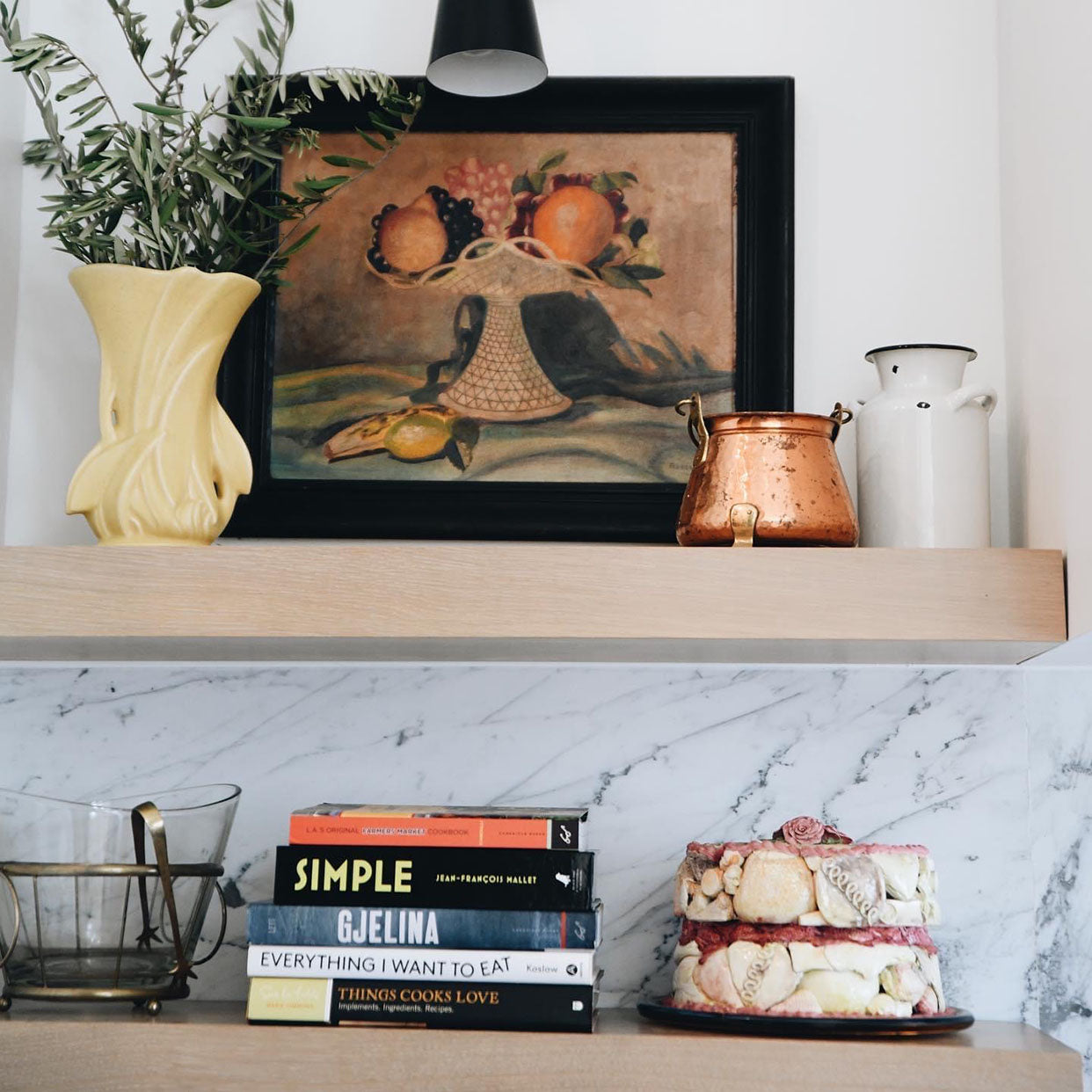 Vintage art on floating shelf