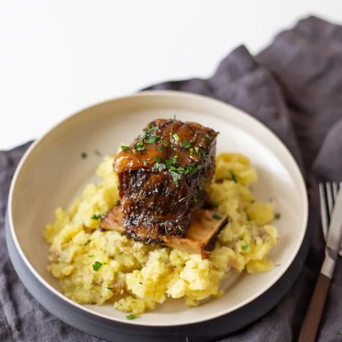 Steam-Braised Short Ribs with Pomegranate Glaze