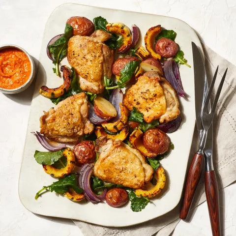 Sheet Pan Roasted Chicken Thighs and Vegetables with Shortcut Romesco Sauce