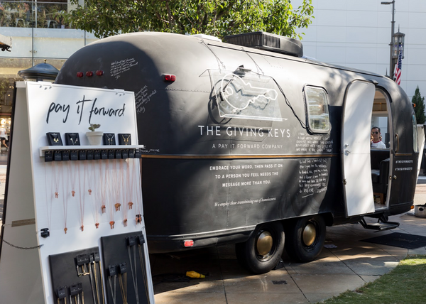 Example of OOH marketing using an airstream, photo is of the giving keys pop-up jewelry shop in a converted airstream trailer, designed and implemented by retail for the people. 