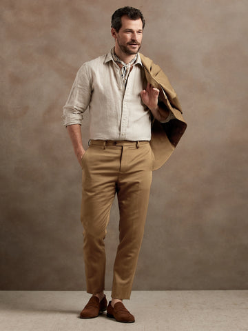 alt="suit with linen shirt"