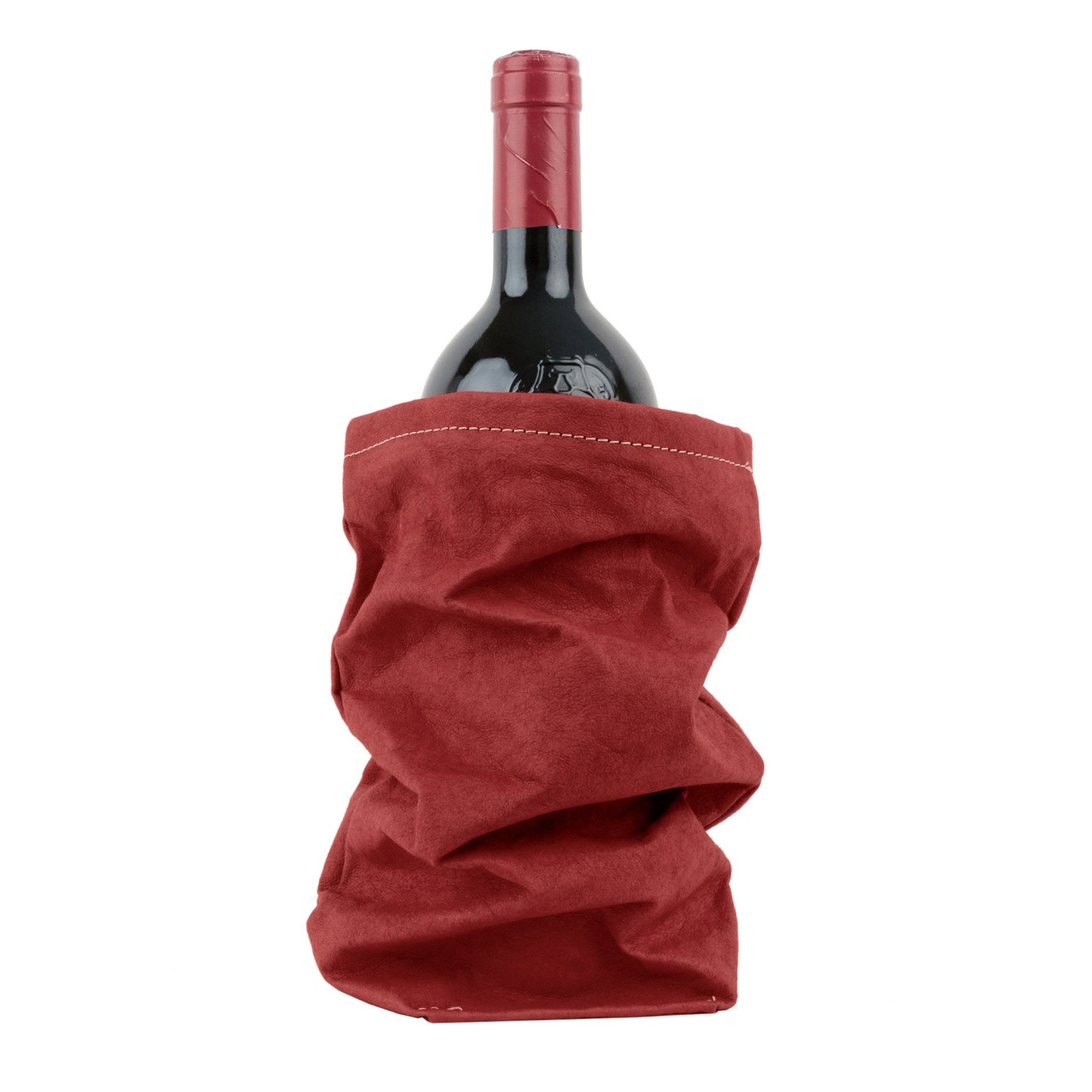 A bottle of red wine is shown inside a red washable paper wine holder.