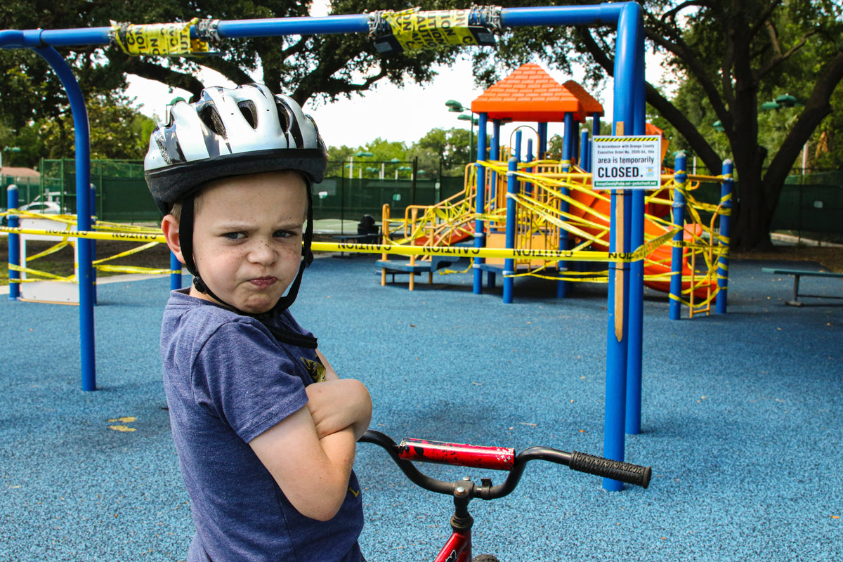 unhappy child due to playground installation