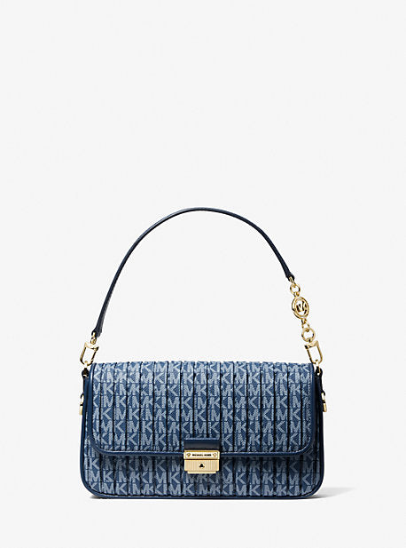 Buy the Michael Kors Suri Small Logo Perforated Suede Crossbody Bag