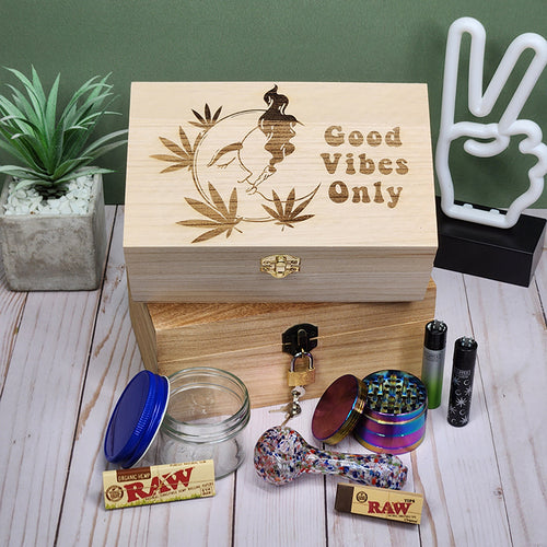 Good Vibes Only design engraved on wooden box with Pipe box items in front of it.