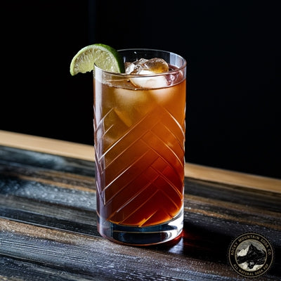  Dark and Stormy cocktail in highball glass with lime wedge garnish
